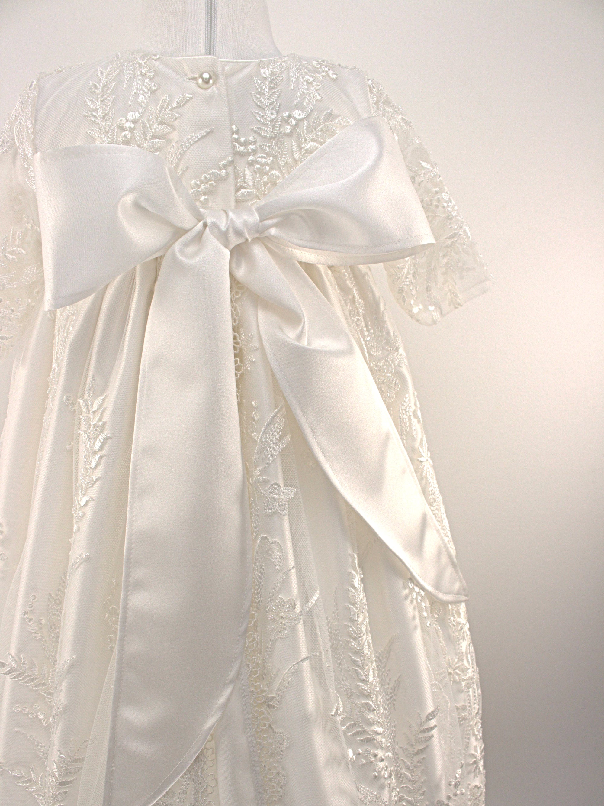 Close-up of the My Blessing Grateful gown’s back bodice featuring delicate lace patterns and button or tie closures.