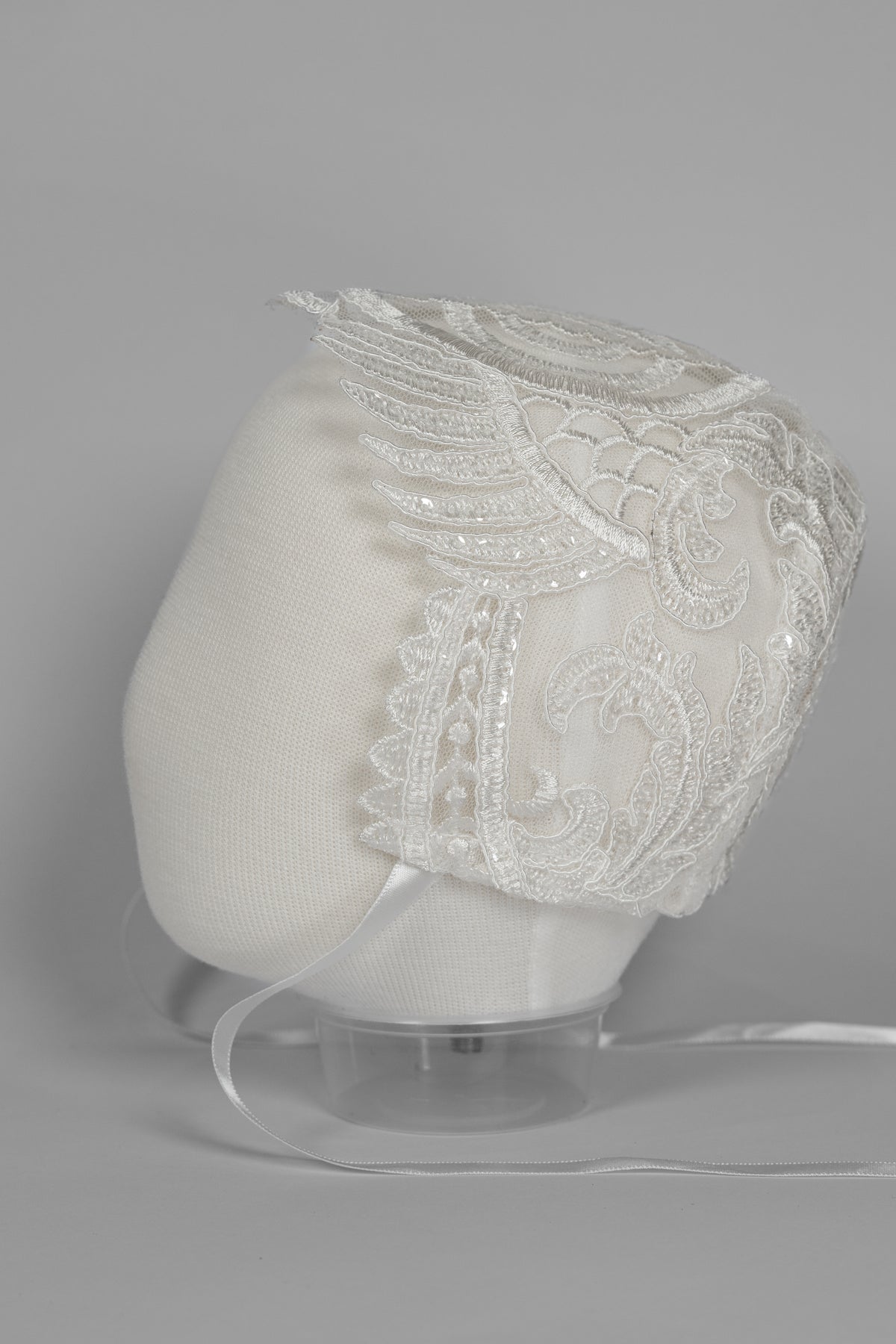 My Blessing ivory christening bonnet from the Lilly set with lace embroidery and satin ties.