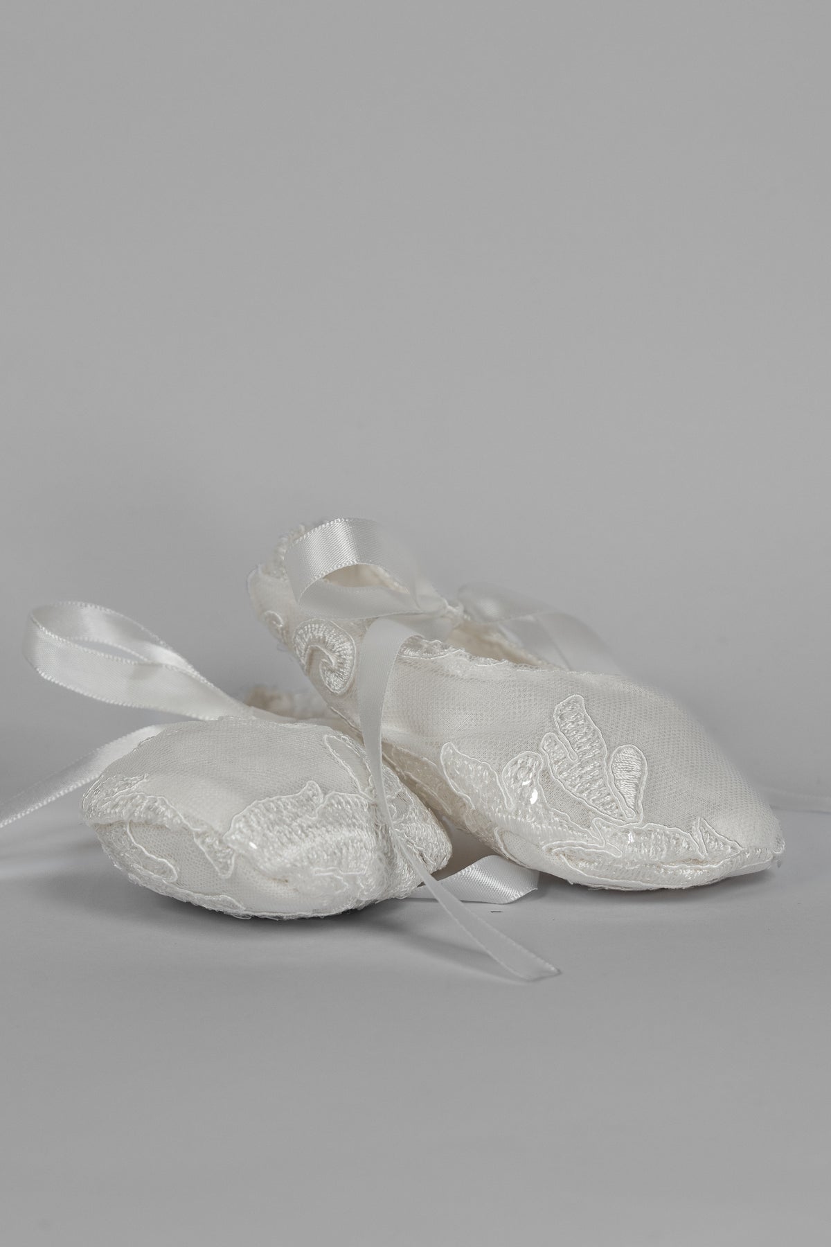 My Blessing ivory christening shoes with a silk finish and lace detailing from the Lilly set.