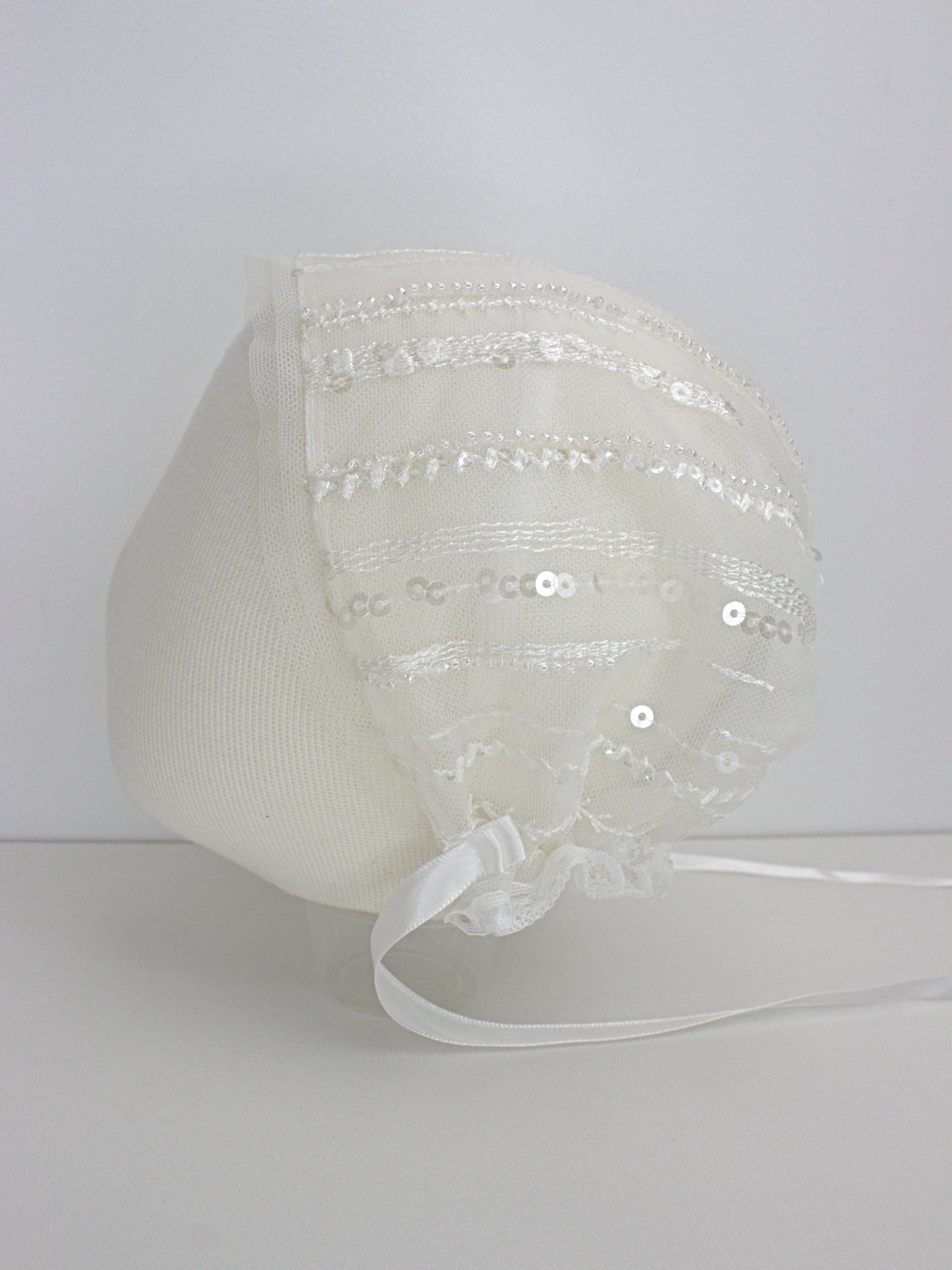 My Blessing Soul ivory christening bonnet from the Soul set with lace embroidery and satin ties.
