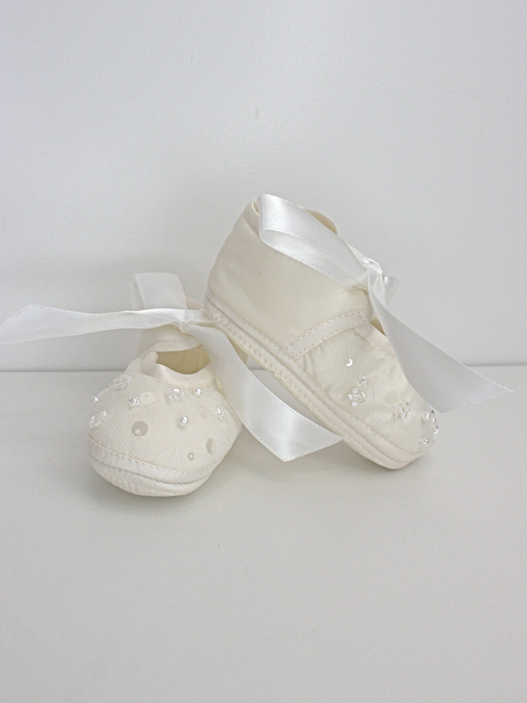 My Blessing ivory christening shoes with satin finish and lace detailing from the Strength set.