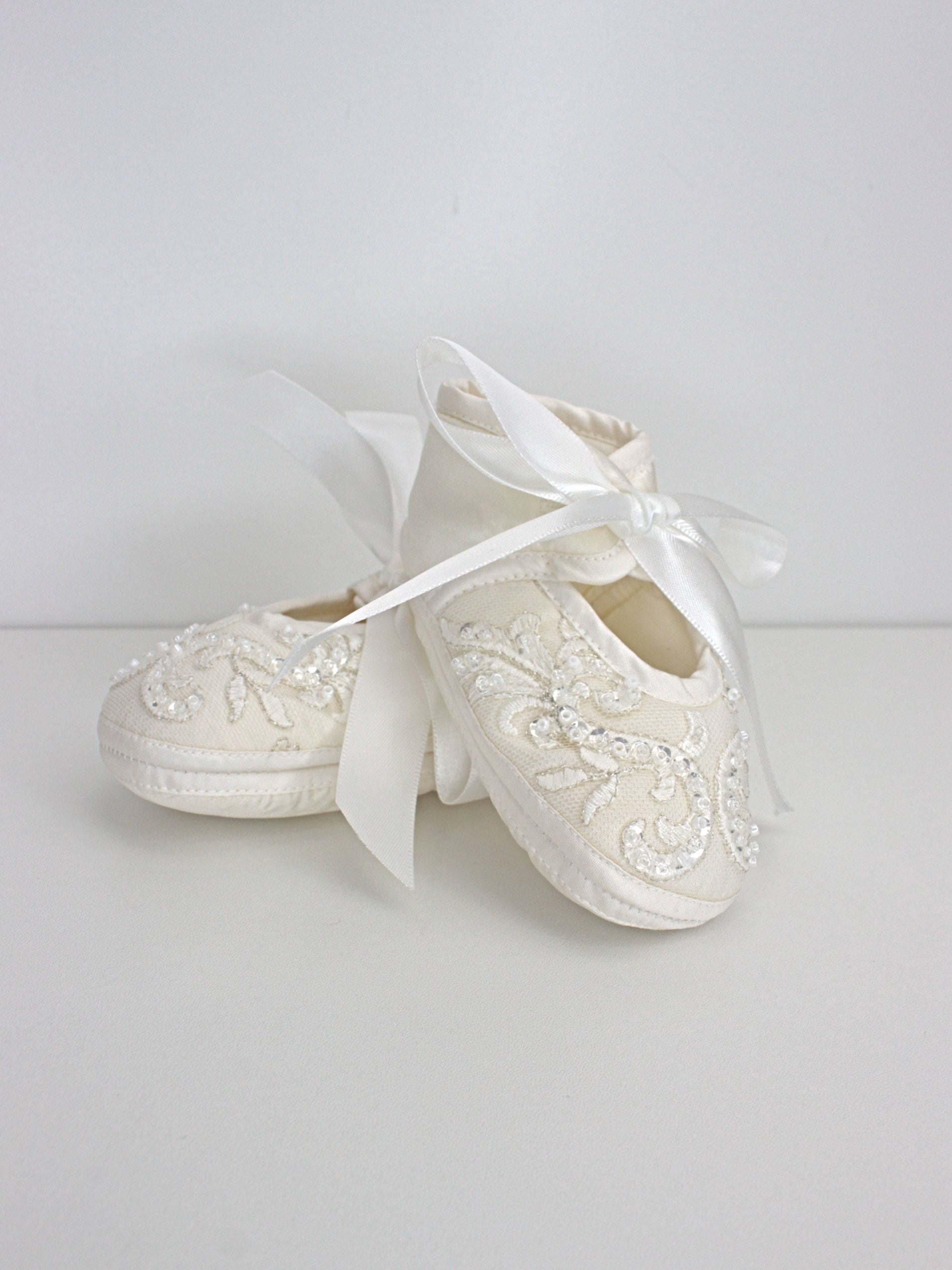 My Blessing ivory christening shoes with satin finish and lace detailing from the Wholesome set.