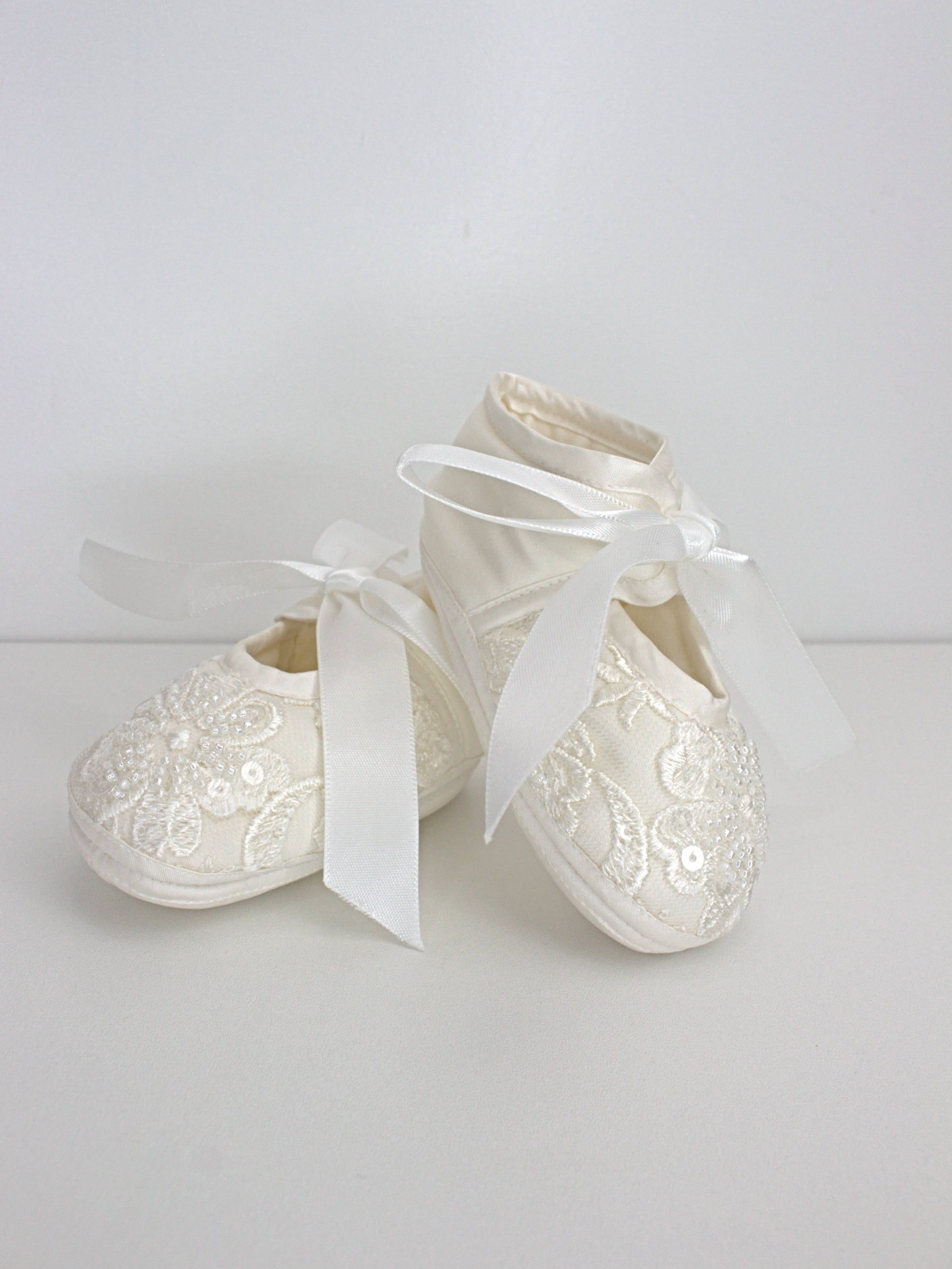 My Blessing ivory christening shoes with satin finish and lace detailing from the Worthy set.
