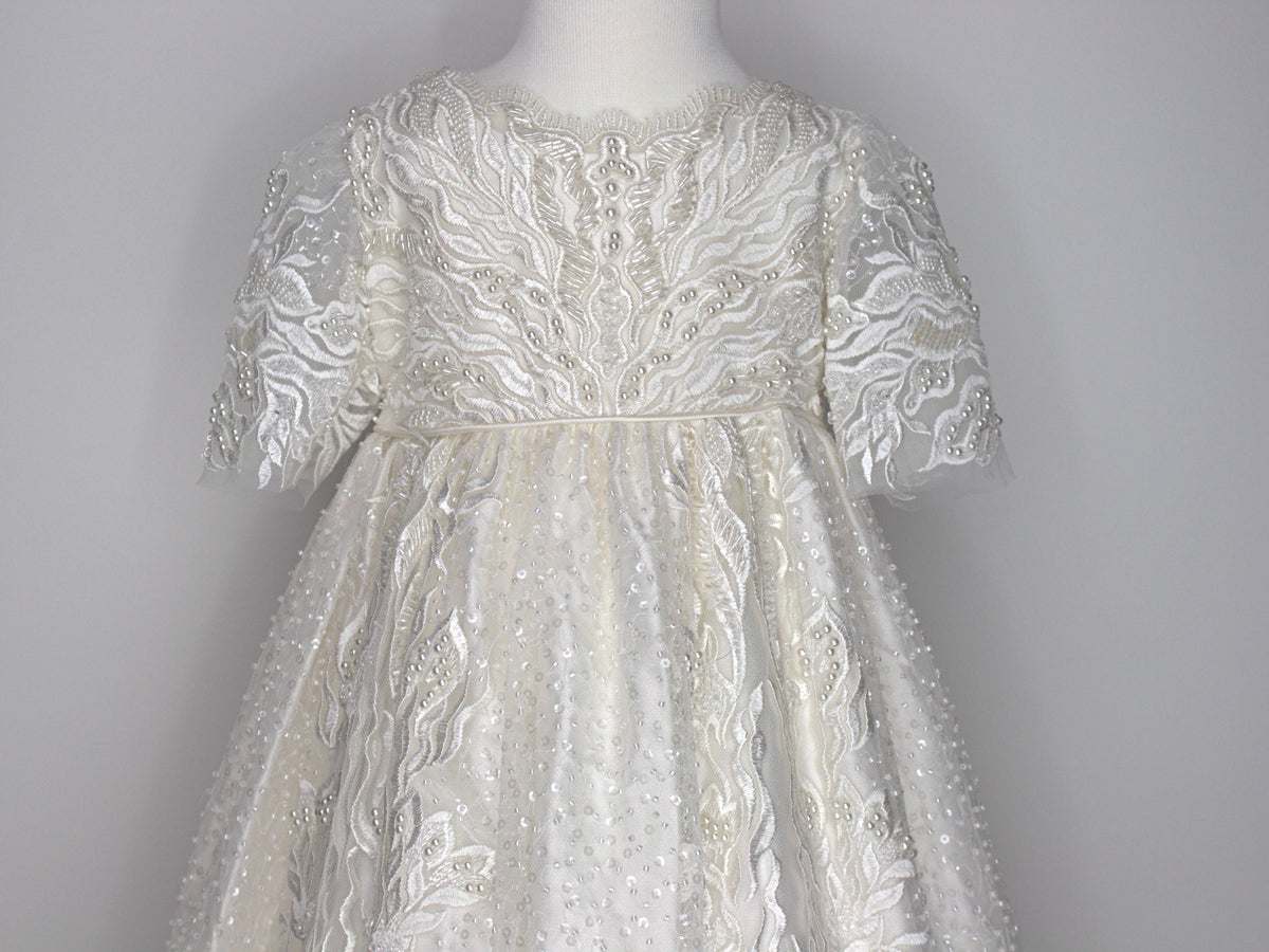 My Blessing Zillah christening gown featuring European bridal lace with intricate beadwork including Swarovski crystals, pearls, tubed glass beads and seed beads.