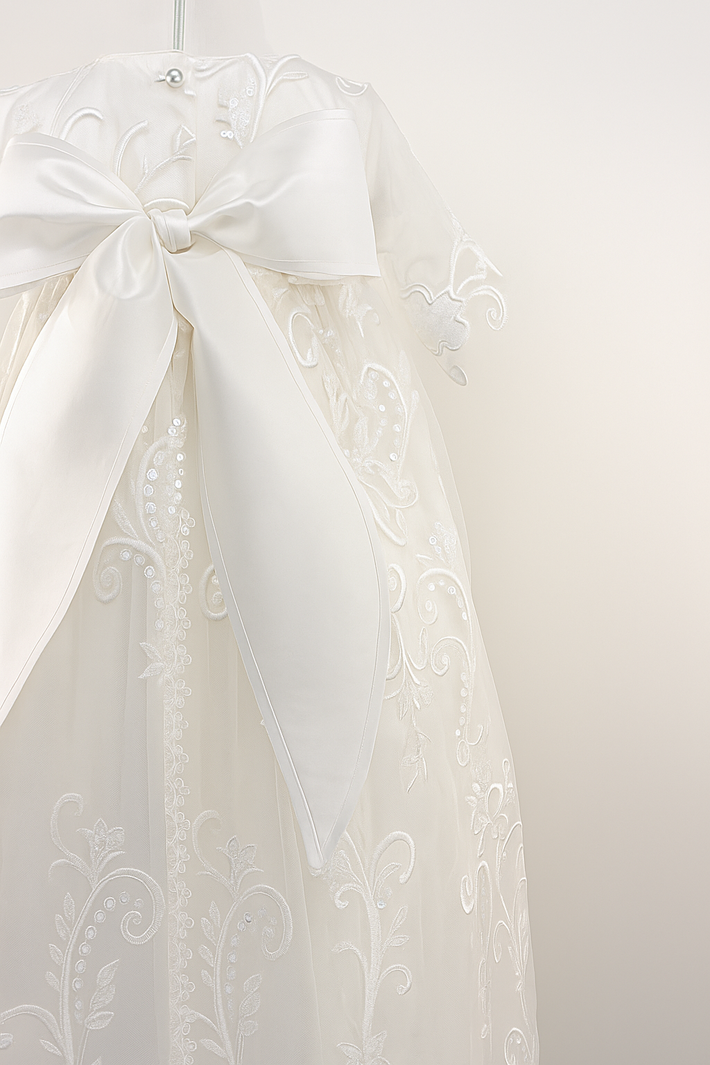 Close-up of the My Blessing Calm gown’s back bodice featuring delicate lace patterns and button or tie closures.