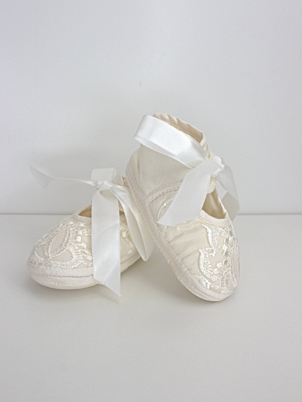 My Blessing ivory christening shoes with satin finish and lace detailing from the Divine set.