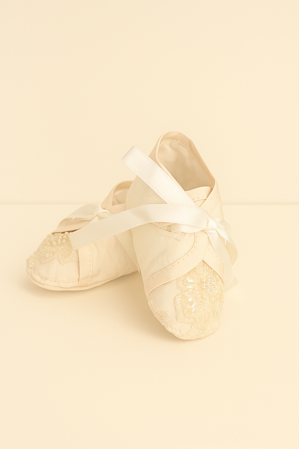My Blessing ivory christening shoes with lace detailing embellished with reflective sequins and glass seed beads from the Fruitful set.