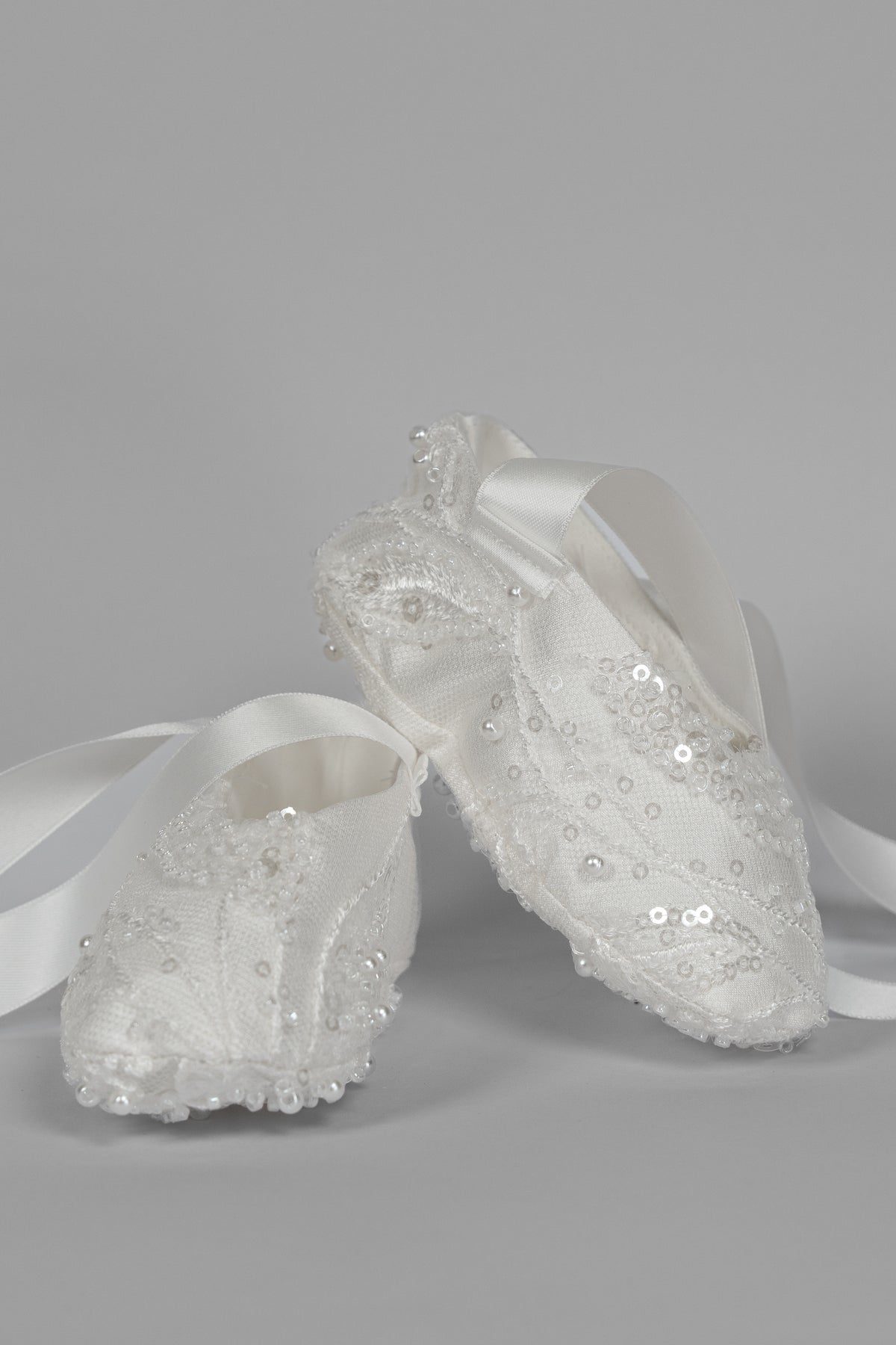 My Blessing ivory christening shoes with lace detailing embellished with glass seed beads and pearls from the Gianna set.