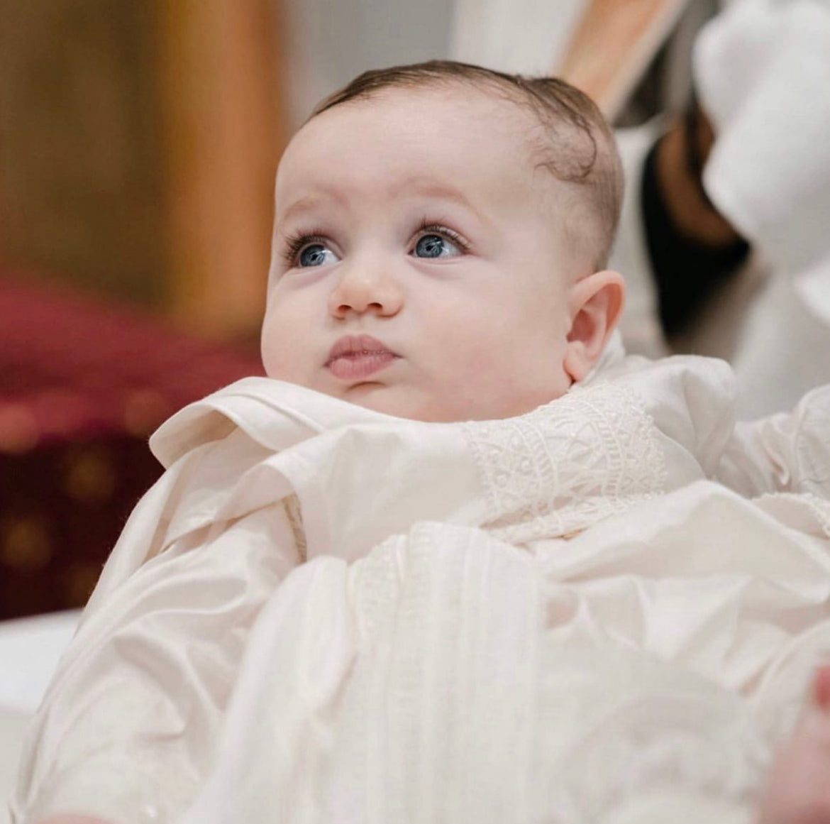 Close-up of the My Blessing Lael Dupioni silk romper showing the soft natural texture and classic ivory lace panel.