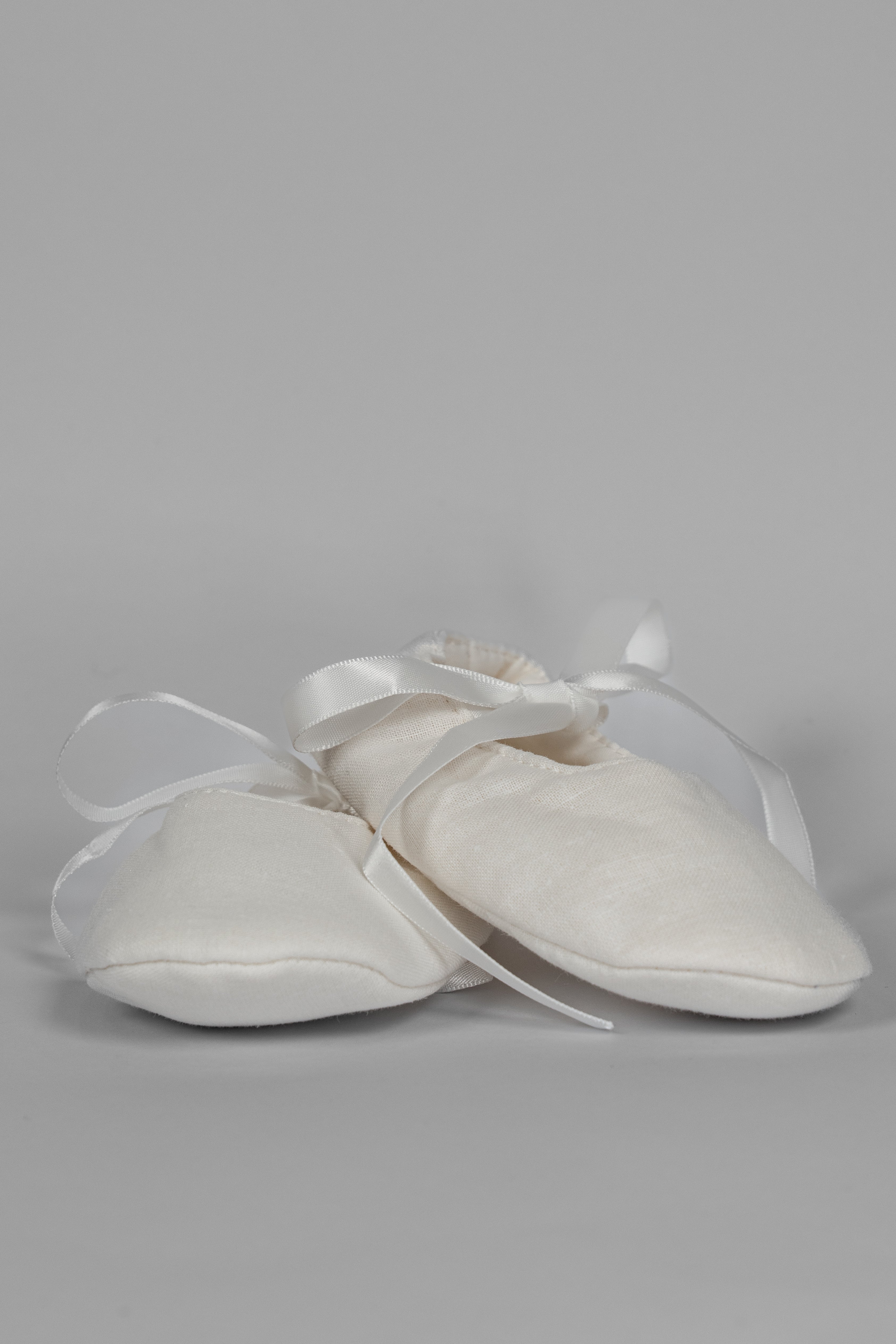 My Blessing ivory christening shoes from the Noa set made from soft linen for a clean, minimalist look.