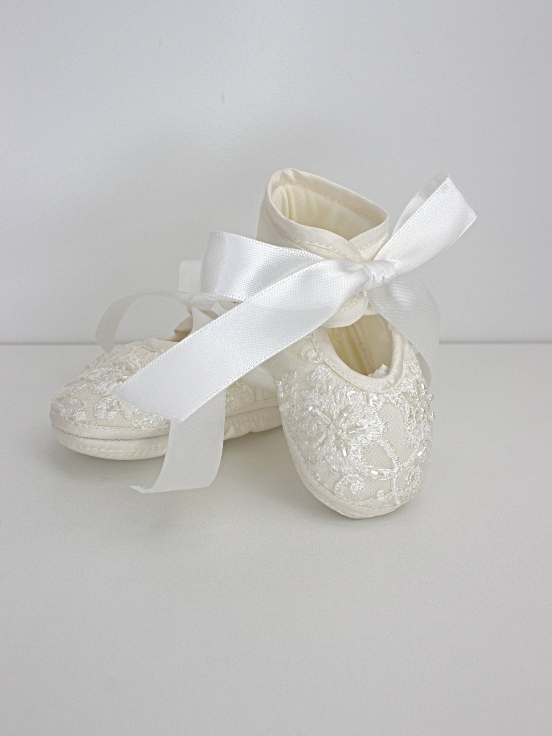My Blessing ivory christening shoes with satin finish and lace detailing from the Noble set.