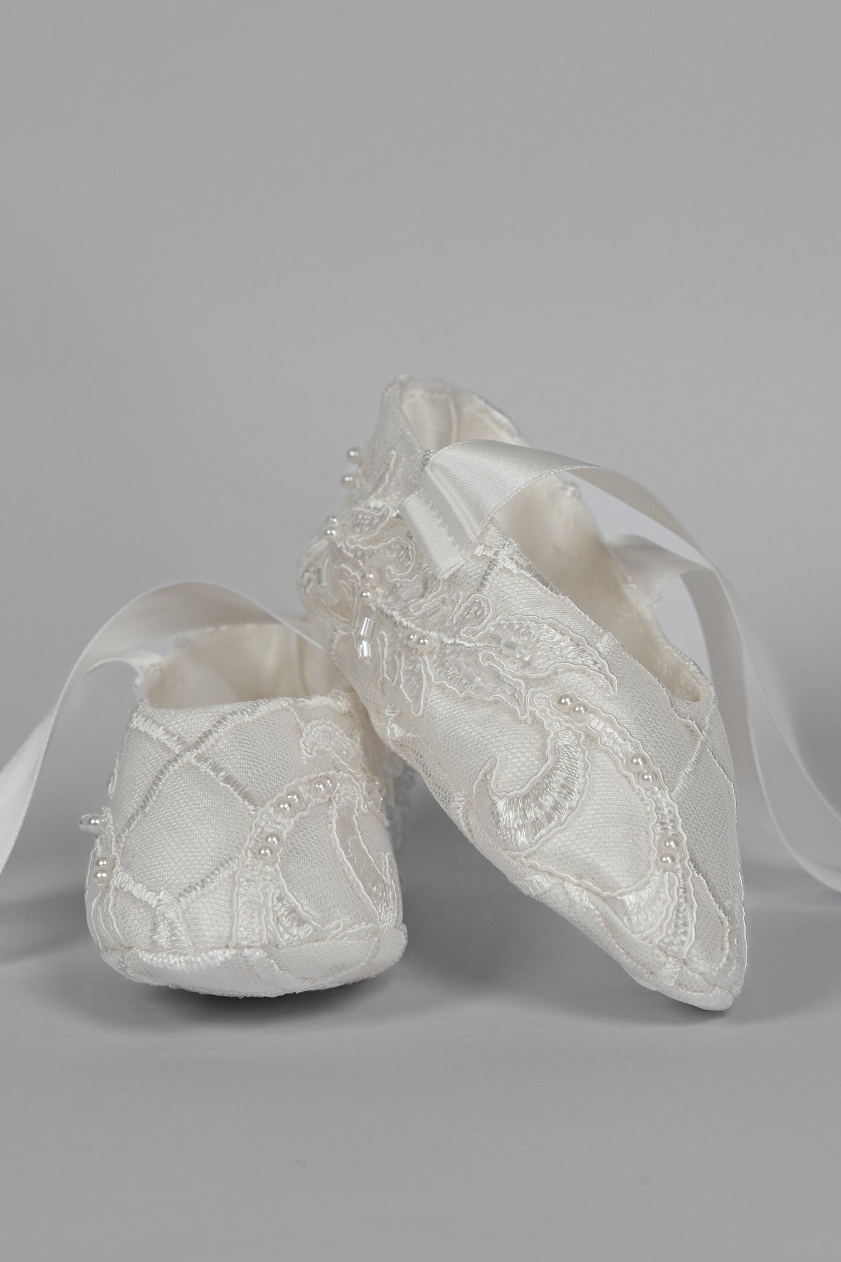 My Blessing ivory christening shoes with lace detailing embellished with glass seed beads and pearls from the Psalms set.